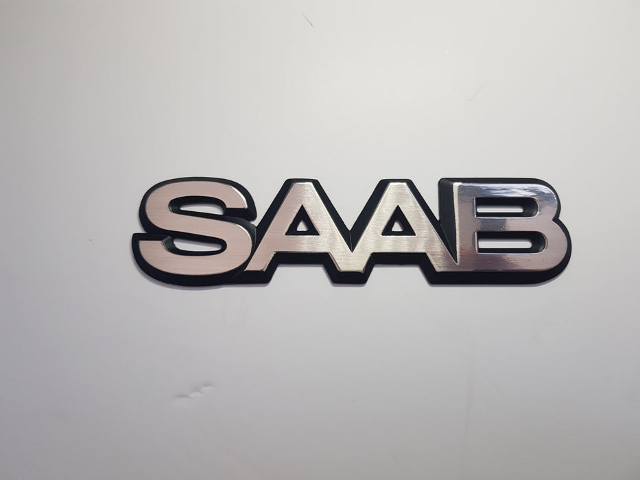 99/900 flat back 'SAAB' badge