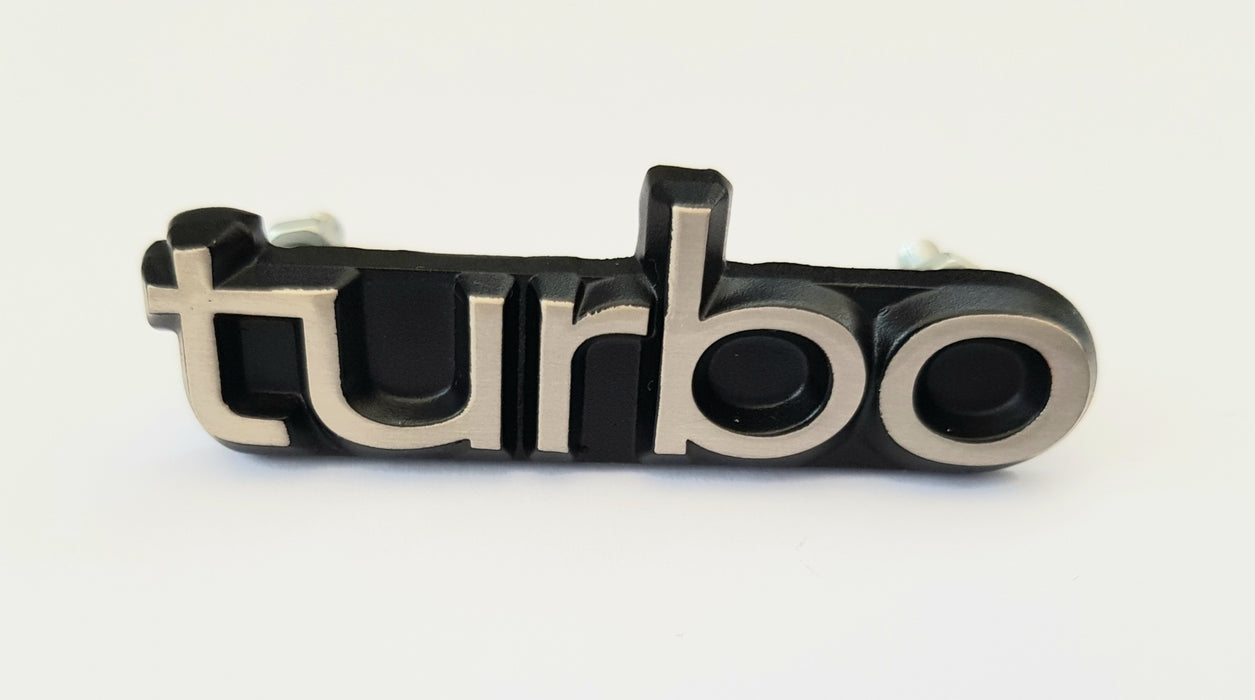 C900 or 9000 Turbo grill badge part no 6926786 65mm x 20mm x 3mm supplied with fittings